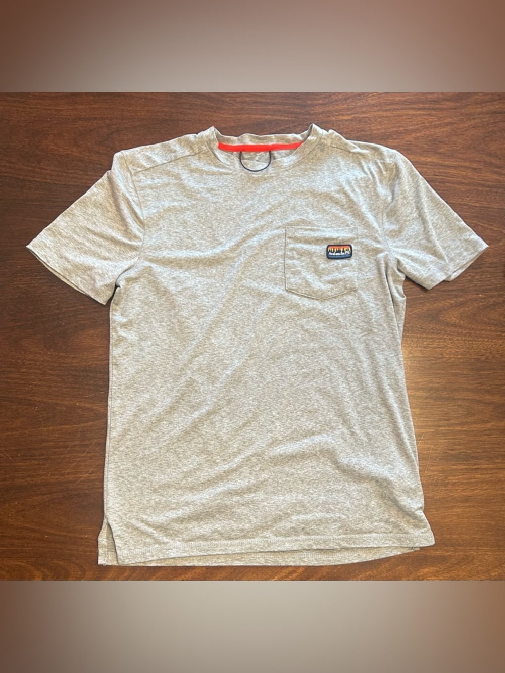 Avalanche Heather Gray Short Sleeve Tee with Red Neck Trim and Pocket Patch